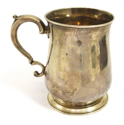 Lot 1192 - A George II Silver Mug, Richard Guerney and Thomas Cook, London 1751, of typical baluster form with