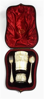 Lot 1194 - A Victorian Silver Christening Set, Atkin Brothers, Sheffield 1893, comprising beaker, napkin ring