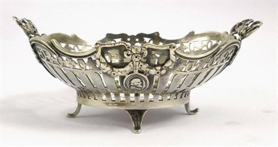 Lot 1258 - A Set of Four Silvered Metal Baskets, Dutch, circa 1910, each with finely pierced sides and bow...