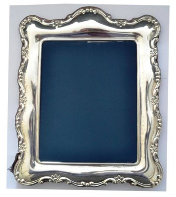 Lot 1016 - A Modern Silver Photograph Frame, Carr's of Sheffield Ltd, Sheffield 1989, with an embossed...
