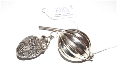 Lot 1083 - A Victorian Silver Pendant, George Unite & Sons, Birmingham 1886, melon shaped, opening to reveal a