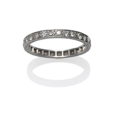 Lot 1093 - A Diamond Full Eternity Ring, single-cut diamonds in white claw settings to a flat sided shank,...