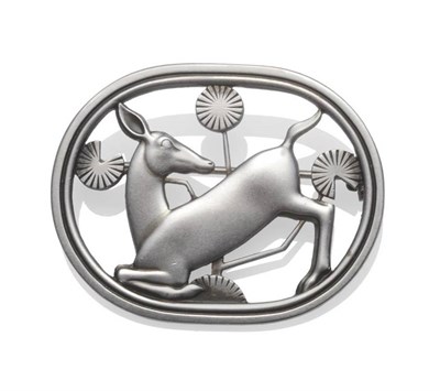 Lot 1125 - A Silver Brooch, by Georg Jensen, numbered 256, in the form of a kneeling deer, measures 4.6cm...