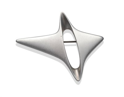 Lot 1132 - A Silver Brooch, by Georg Jensen, the four pointed asymmetric star form with central aperture,...