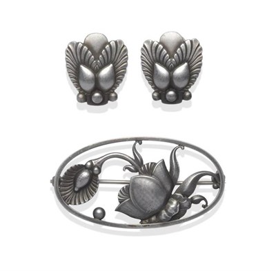 Lot 1133 - A Floral and Leaf Brooch, and A Pair of Similar Earrings, by Georg Jensen, the oval openwork brooch