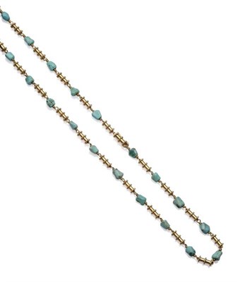 Lot 1141 - A Turquoise Necklace, barrel shaped links with rope twist decoration spaced by turquoise...