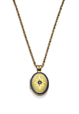 Lot 1168 - An 18 Carat Gold Locket, the oval locket with a round cut sapphire centrally, within a yellow...