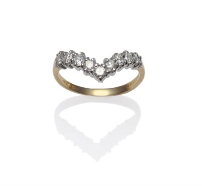 Lot 1169 - An 18 Carat Gold Diamond Wishbone Ring, set with round brilliant cut diamonds in white claw...