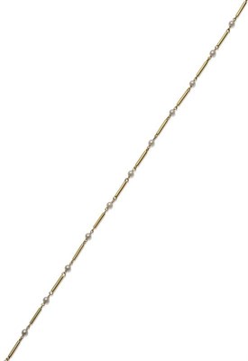 Lot 1183 - A Cultured Pearl Necklace, plain polished yellow tube links alternate with cultured pearls,...