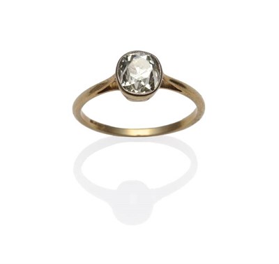 Lot 1207 - A Diamond Solitaire Ring, the old mine cut diamond in a white millegrain fronted setting, on a...