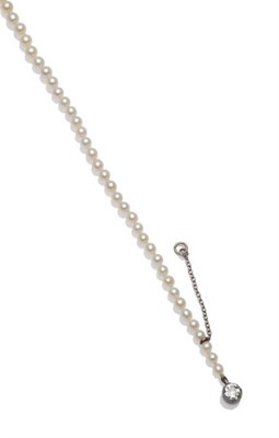 Lot 1210 - A Cultured Pearl Necklace, the graduated pearls knotted to a clasp, set with an old cut...