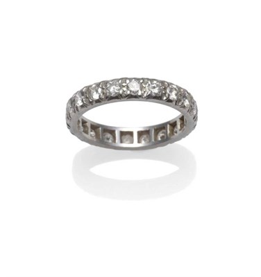 Lot 1228 - A Diamond Eternity Ring, round brilliant cut diamonds in white claw settings, total estimated...