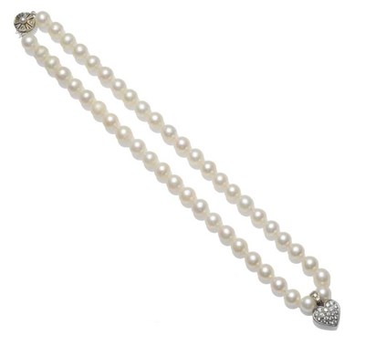 Lot 1235 - A Cultured Pearl Necklace with A Diamond Heart Pendant, the uniform cultured pearls knotted to...