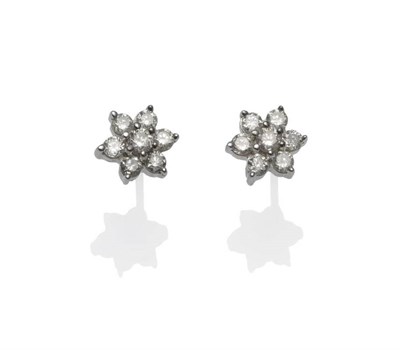 Lot 1238 - A Pair of 9 Carat White Gold Diamond Cluster Earrings, a cluster of round brilliant cut diamonds in