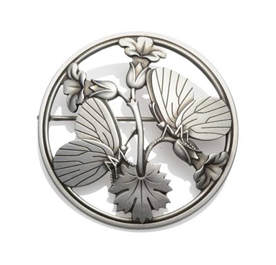 Lot 1242 - A Silver Brooch, by Georg Jensen, the round brooch with butterfly and floral motifs, numbered...