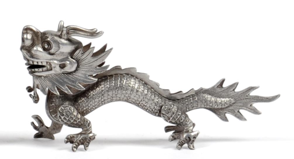 Lot 1008 - A Chinese Export Silver Place Card Holder, Wang Hing, naturalistically modelled as a dragon,...