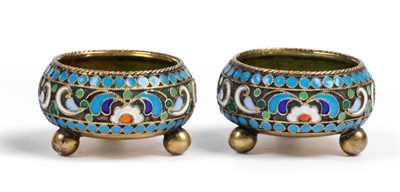 Lot 1012 - A Pair of Russian Salts, Pyeter Baskakav, Moscow 1883-1908, of cauldron from with typical enamelled