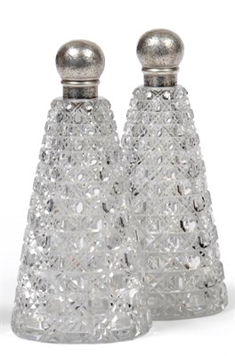 Lot 1031 - A Pair of Victorian Silver Mounted Cut Glass Cologne Bottles, Sampson Mordan & Co, London 1886, the