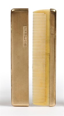 Lot 1048 - A 9ct Gold Comb Case, sponsor's mark SJR, Sheffield 1982, rectangular with panels of engine...