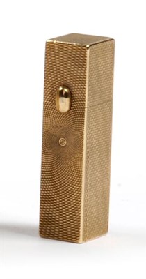 Lot 1049 - A 9ct Gold Lipstick Holder, Garrard & Co, London 1968, rectangular with allover engine turned...