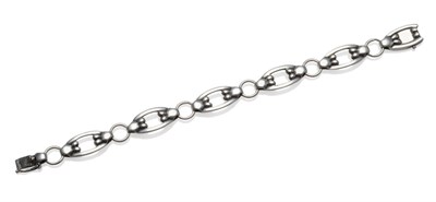 Lot 1125 - A Bracelet, by Georg Jensen, of oval links, with berry style decoration, numbered 54, length 20cm