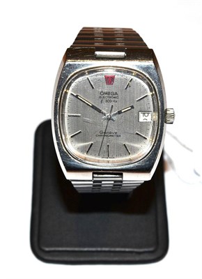 Lot 1131 - A Stainless Steel Electronic Calendar Centre Seconds Wristwatch, signed Omega, Geneve, Chronometer