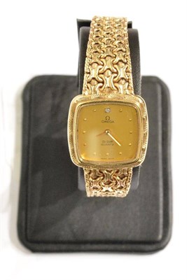 Lot 1147 - A Lady's 9ct Gold Wristwatch, signed Omega, model: De Ville, circa 1975, quartz movement, gilt...