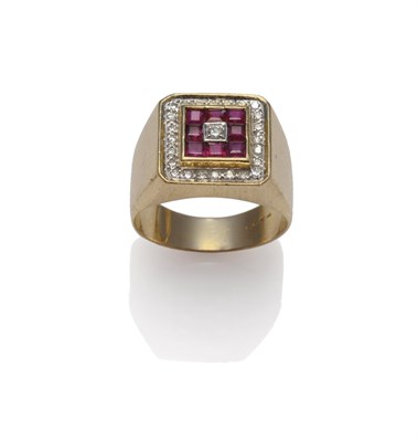 Lot 1177 - A Gentleman's Diamond and Ruby Ring, a central round brilliant cut diamond is bordered by a row...