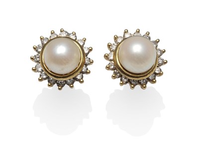 Lot 1197 - A Pair of Cultured Pearl and Diamond Earrings, a cultured pearl stud with a removable hoop of round