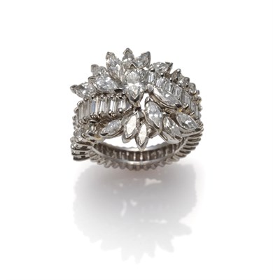 Lot 1203 - A Diamond Cluster Ring, marquise cut diamonds in a spray formation, to a twist band of baguette cut
