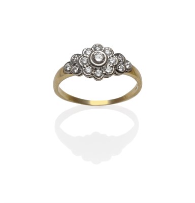 Lot 1205 - An 18 Carat Gold Diamond Cluster Ring, the round brilliant cut diamonds in white collet...