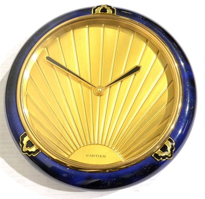Lot 1215 - A Desk Timepiece, signed Cartier, circa 2000, quartz movement, sunburst dial, strut case with a...