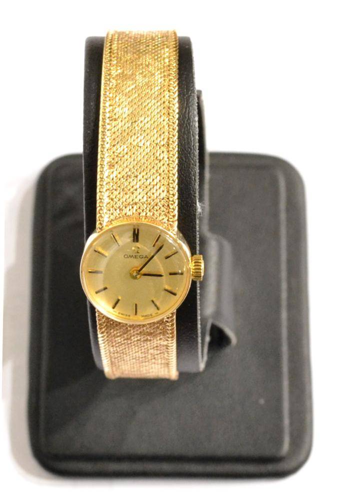 1984 Ladies Omega petite Tonneau wristwatch in Solid 9ct Gold with strap - Buckle - Box