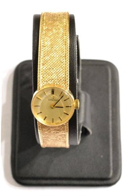 Lot 1230 - A Lady's 9ct Gold Wristwatch, signed Omega, 1974, (calibre 485) lever movement numbered...
