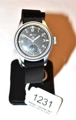Lot 1231 - A Military Wristwatch, signed Timor, circa 1945, lever movement, black dial with luminous...