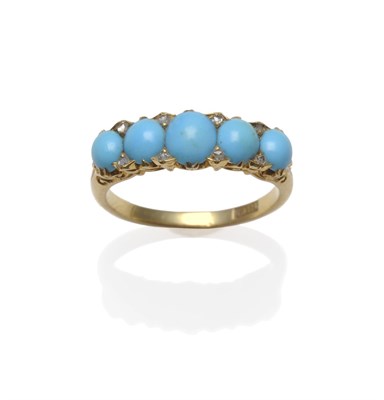 Lot 1245 - An Early 20th Century Turquoise and Diamond Ring, five graduated cabochon turquoise spaced by pairs