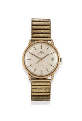 Lot 1255 - A 9ct Gold Automatic Calendar Centre Seconds Wristwatch, signed Jaeger LeCoultre, 1968,...