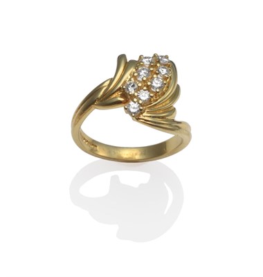 Lot 2001 - An 18 Carat Gold Diamond Set Ring, the spray form of eight round brilliant cut diamonds within...