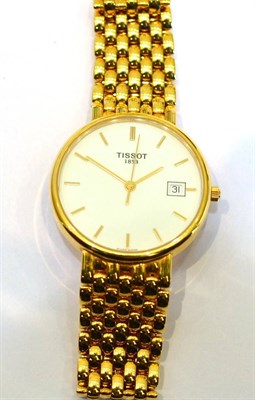 Lot 2015 - An 18ct Gold Centre Seconds Calendar Wristwatch, signed Tissot, circa 2011, quartz movement,...