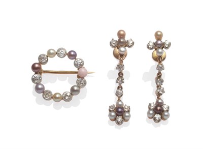 Lot 2034 - A Cultured Pearl and Diamond Hoop Brooch, the pearls in tones of purple and grey alternate with old