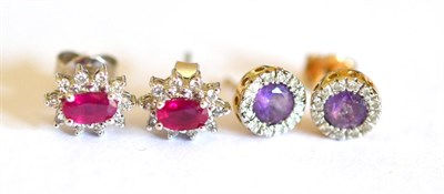Lot 2046 - A Pair of 9 Carat Gold Cluster Stud Earrings, a round purple stone within a border of diamonds, and