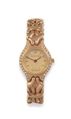 Lot 2073 - A Lady's 9ct Gold Diamond Set Wristwatch, signed Bueche Girod, circa 1997, en suite to the previous