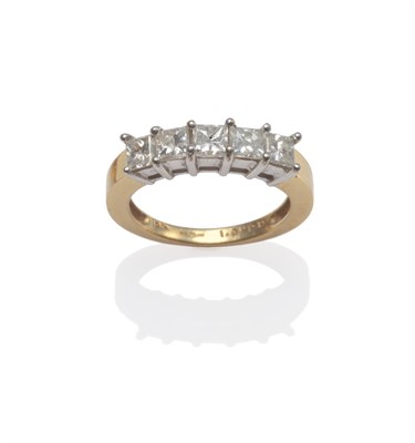 Lot 2081 - An 18 Carat Gold Diamond Five Stone Ring, the princess cut diamonds in white claw settings, to...