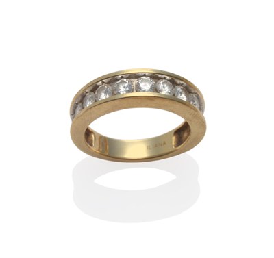 Lot 2090 - A Diamond Half Hoop Ring, the round brilliant cut diamonds in a yellow channel setting, total...
