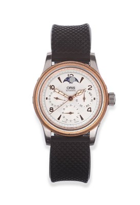 Lot 2101 - A Bi-Metal Automatic Calendar Centre Seconds Moonphase Wristwatch with 24-hour Indication,...