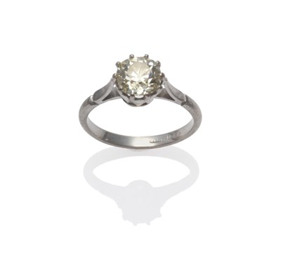 Lot 2108 - A Diamond Solitaire Ring, the old cut diamond in a white ten claw setting, to pointed shoulders...