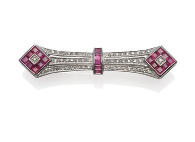 Lot 2119 - An Art Deco Style Ruby and Diamond Brooch, the geometric form pavé set with round brilliant...