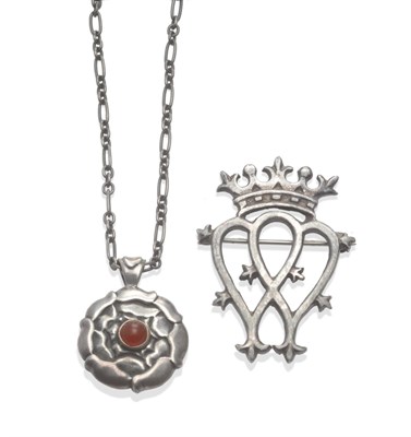 Lot 2129 - A Silver Pendant on Chain, by Georg Jensen, in the form of a rose with a cabochon cornelian...