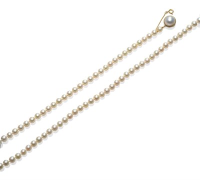 Lot 2134 - A Cultured Pearl Necklace, a row of uniform pearls knotted to a mabe pearl clasp, length 60cm