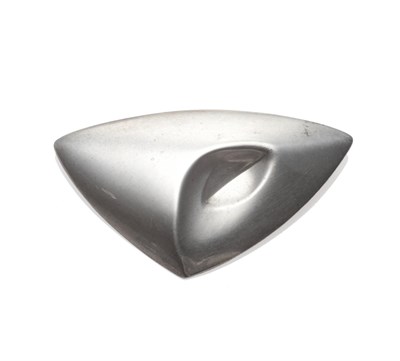 Lot 2137 - A Modernist Brooch, by Georg Jensen, the triangular piece with a concave section, numbered 748,...